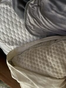 a cooling pillow with a mattress topper and cooling blanket