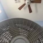 a couple fans ceiling and floor for bedroom