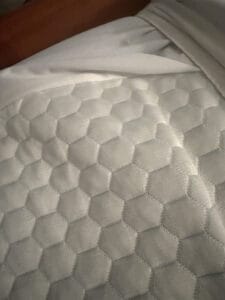 mattress topper on bed cooling
