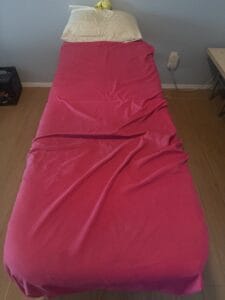 a massage table in home for stretching out