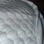 a mattress topper on bed for bedroom setup