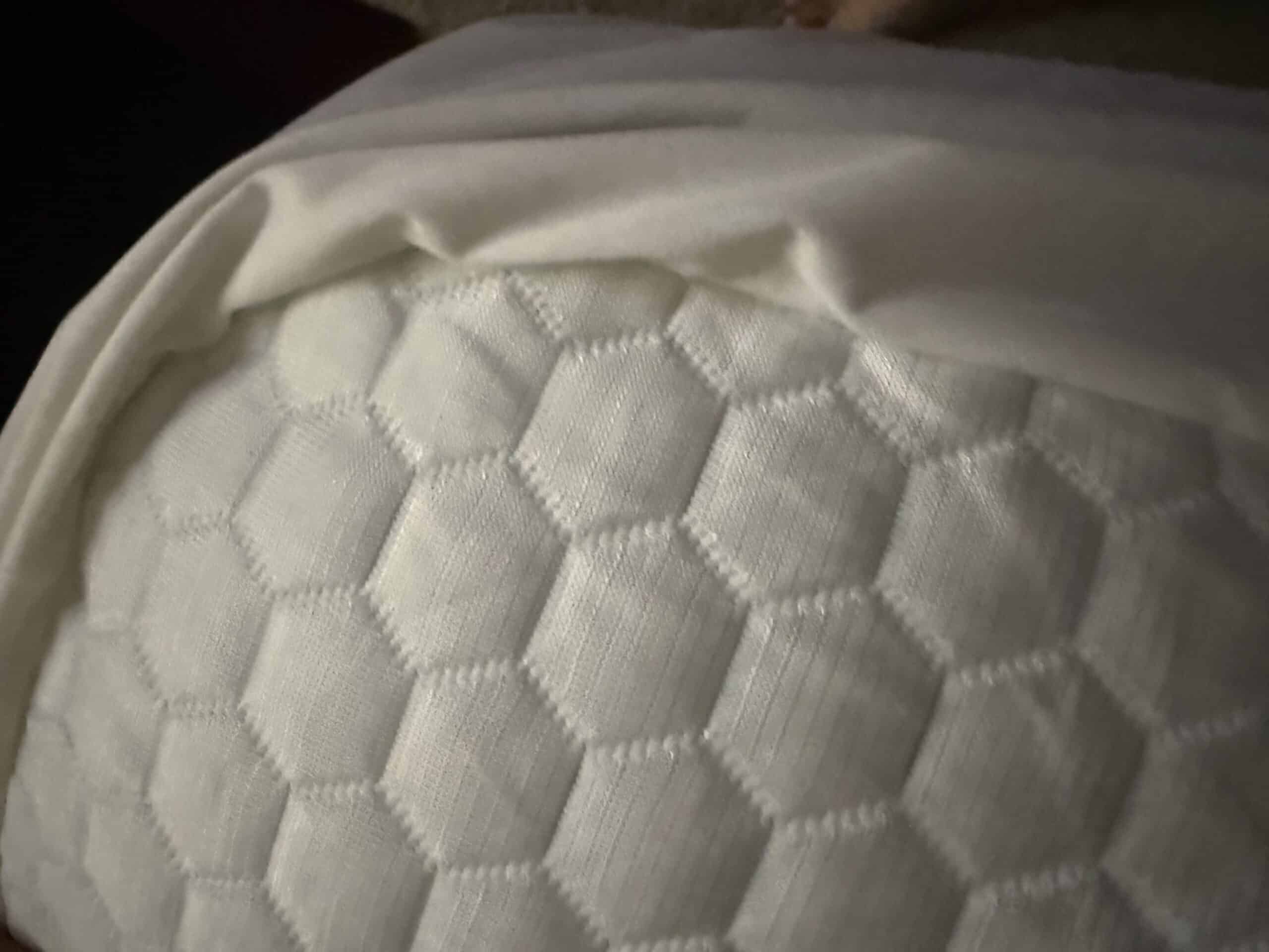 How Heavy Is a Mattress Topper: Weight by Material and Handling One Alone