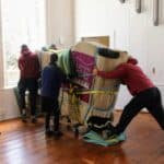 moving group moving a mattress in home