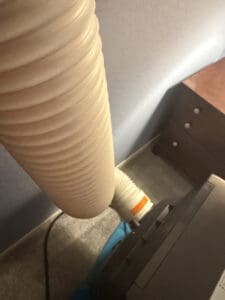 a portable ac hose attached