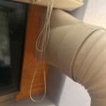 a portable ac hose in an insulation kit for window