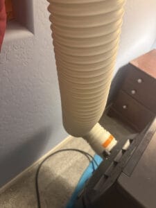 a portable ac hose in the machine