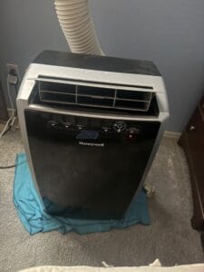 a portable ac in bedroom setup