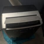 a portable ac unit in bedroom for cooling in hot summers