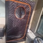 a portable sauna outside a home