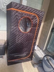 a portable sauna outside a home