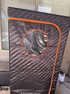 a portable tent sauna outdoors