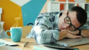 someone napping at desk