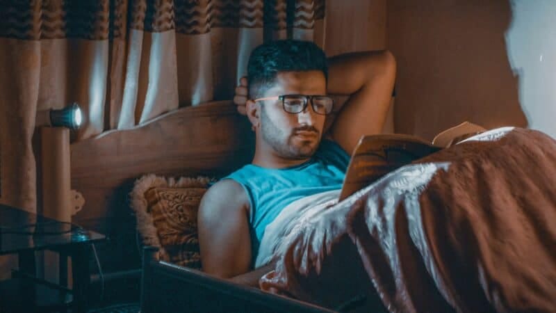 Best Sleep Gear for People Who Read in Bed in 2026: Neck Angle, Light, and Not Waking Anyone