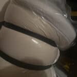 strapped up mattress bag in garage