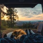 two people sleeping in camper van