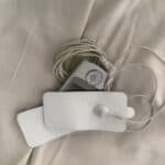 TENS unit laying on bed