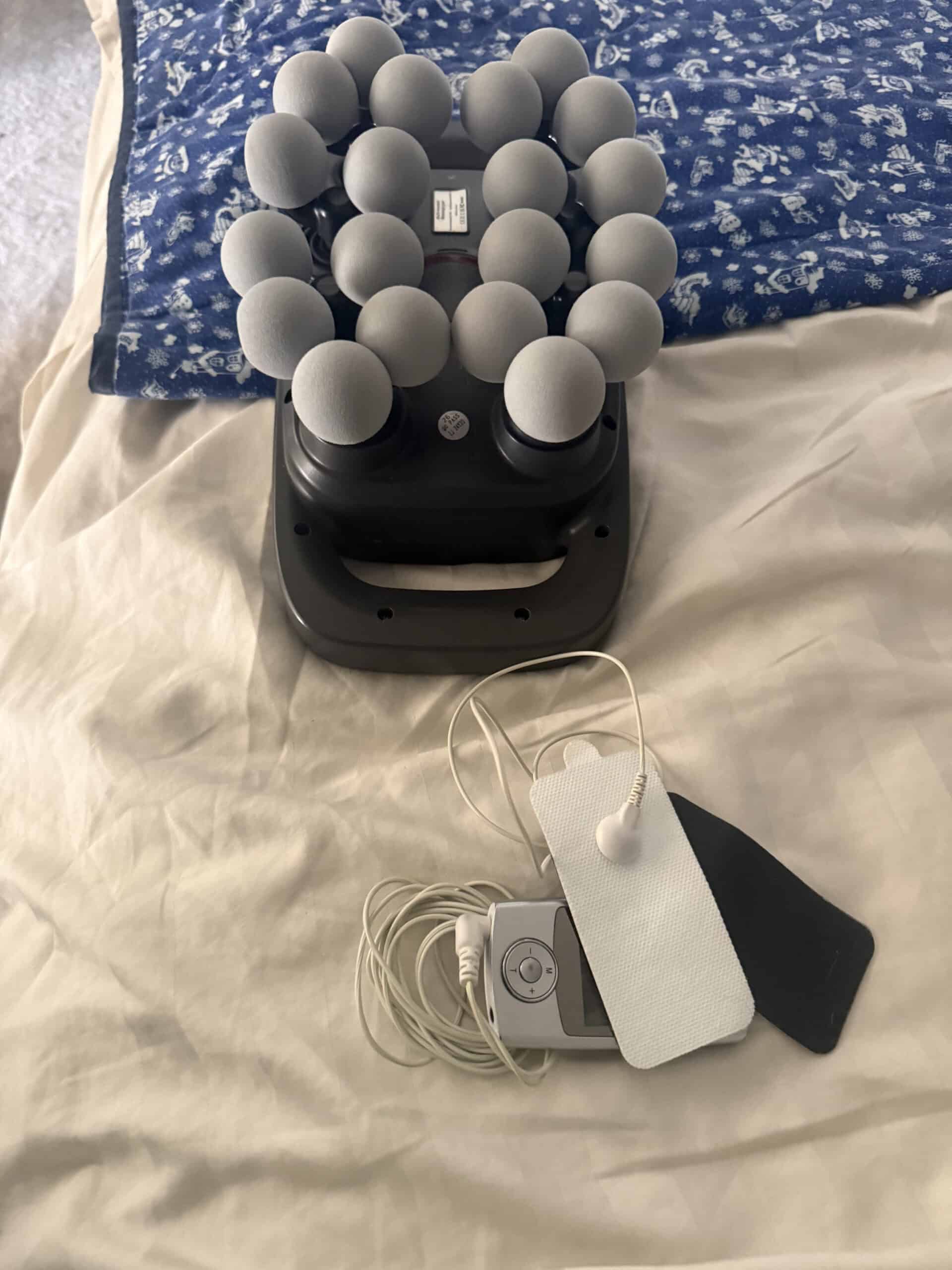 Can You Use a Massage Gun and a TENS Unit Together? How the Two Actually Combine