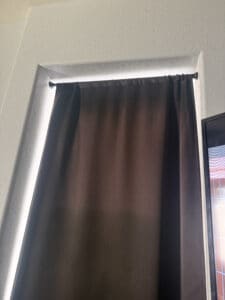 a blackout curtain in bedroom setup