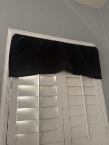 a blackout curtain fit in a window shutter
