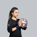 soccer player with elbow padding