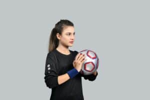 soccer player with elbow padding