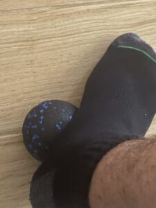 massage ball on feet pressure