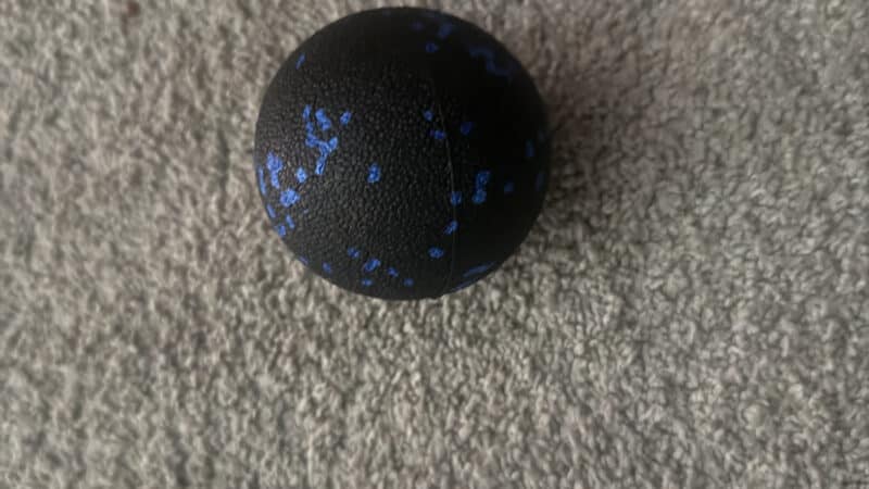 How to Use a Massage Ball on Your Feet While Standing: Bodyweight Is the Whole Technique