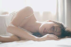 a woman sleeping with her mouth open
