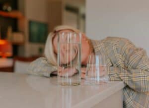 room temperature water in glass in home